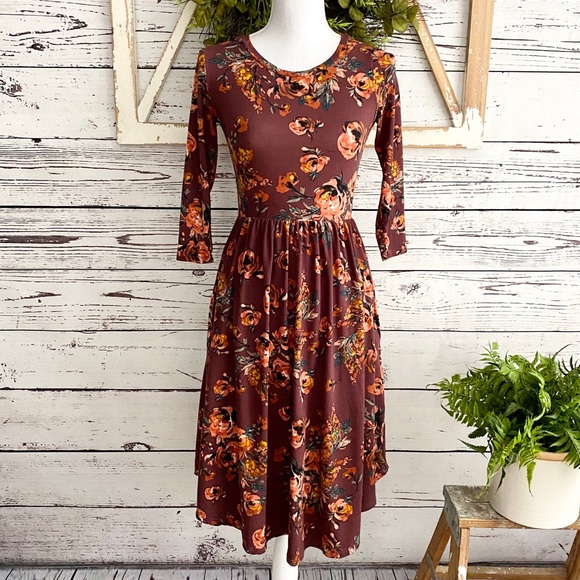 Reborn J Dresses & Skirts - Reborn J Boutique Floral 3/4 Sleeve Jersey Dress